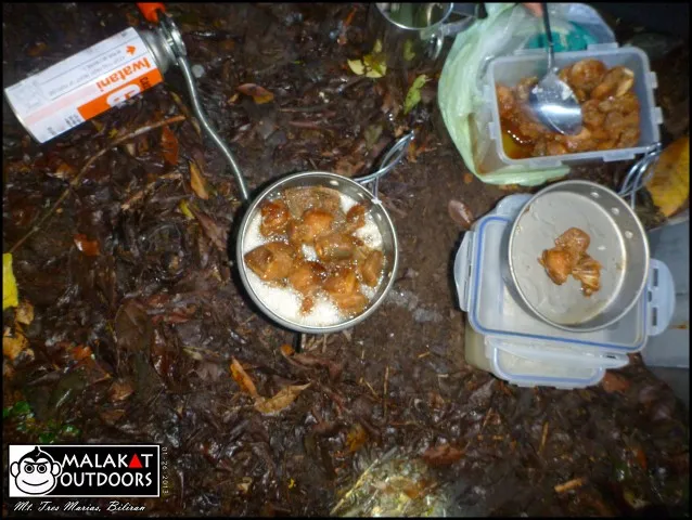 Adobo (cooked Rain style). Not in the picture, the half cooked rice, dried fish &amp; chicken soup Trek like a mountaineer, eat like a King.